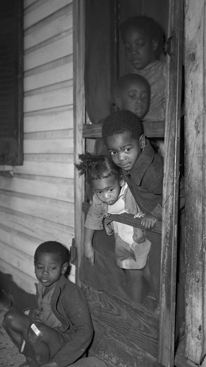 Negro Children in the Front Door of their Home